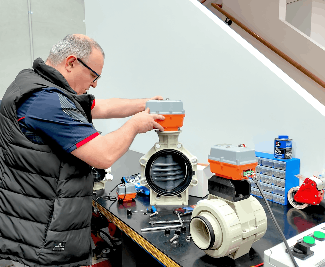 Fluidflo engineer fitting an actuator on a valve