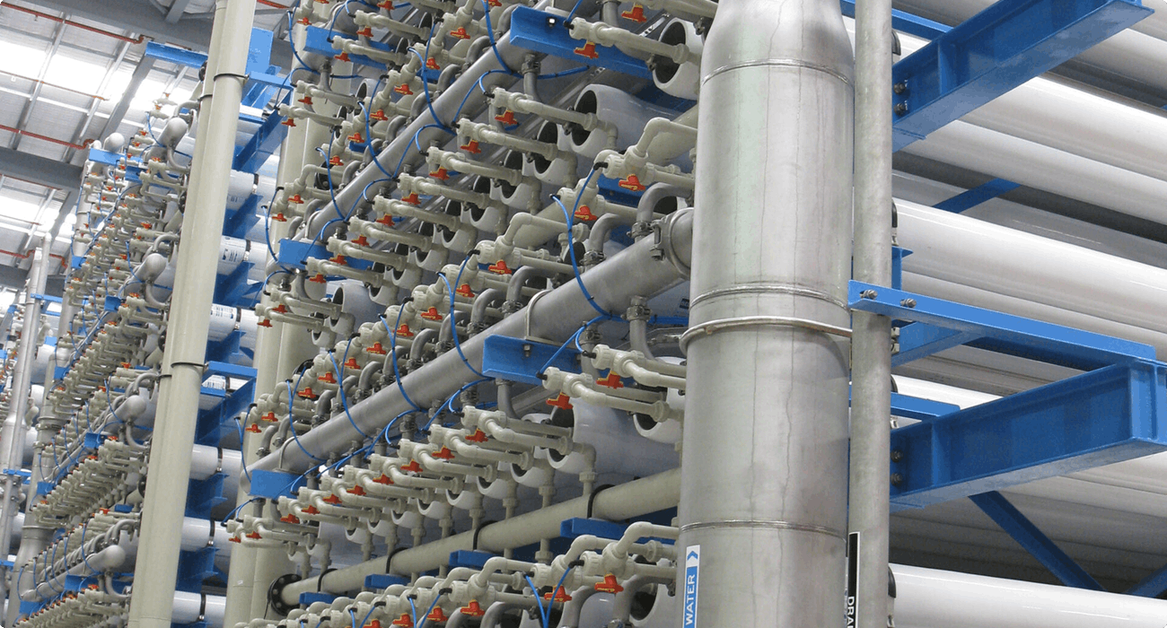 Water treatment facility with an array of pipes with ball valves